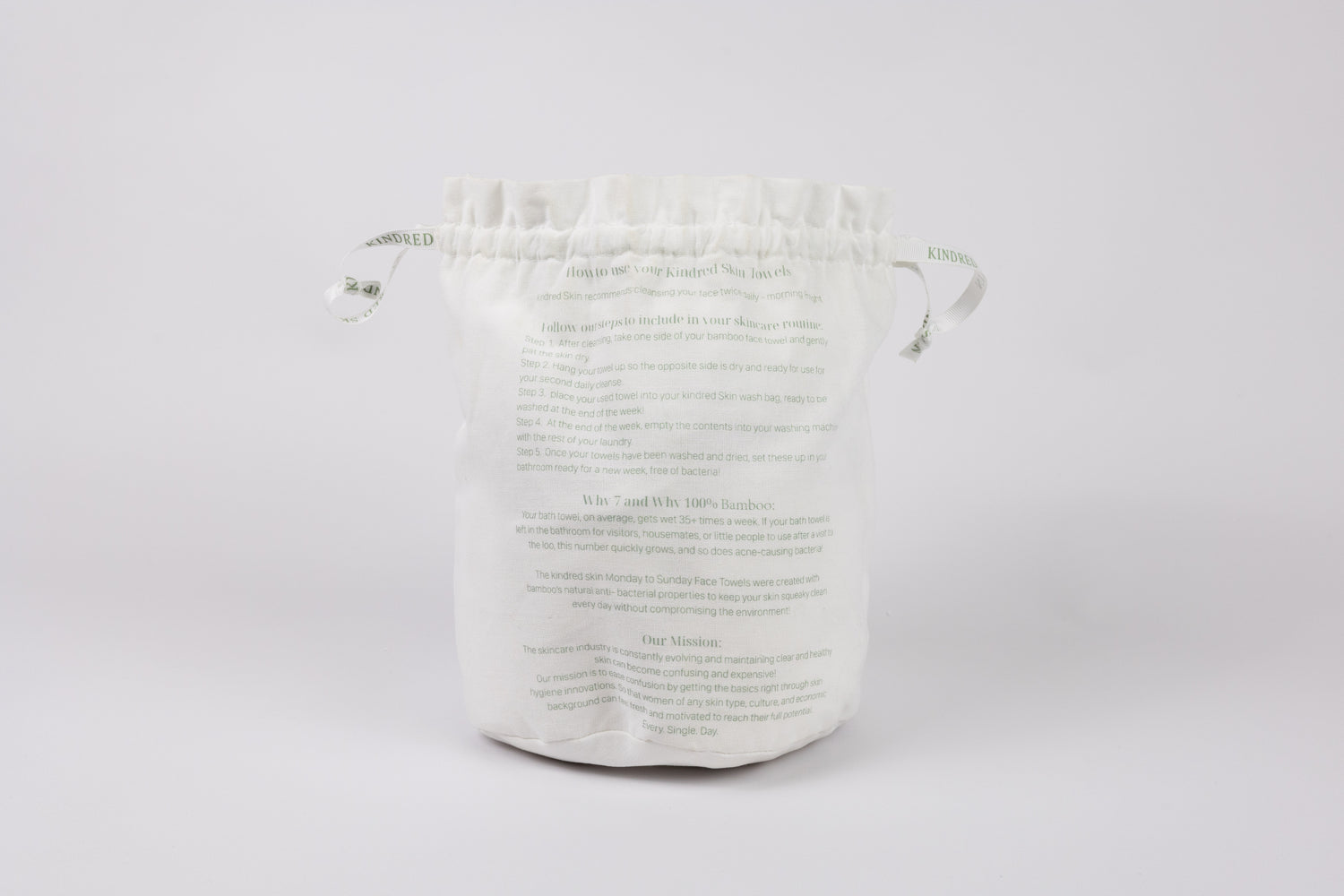 Antibacterial Bamboo Face Towels - Eco-friendly & Luxurious Skincare Essential in a bamboo back with ribbons sitting in bathroom for your basic needs 7 towels in laundry bag