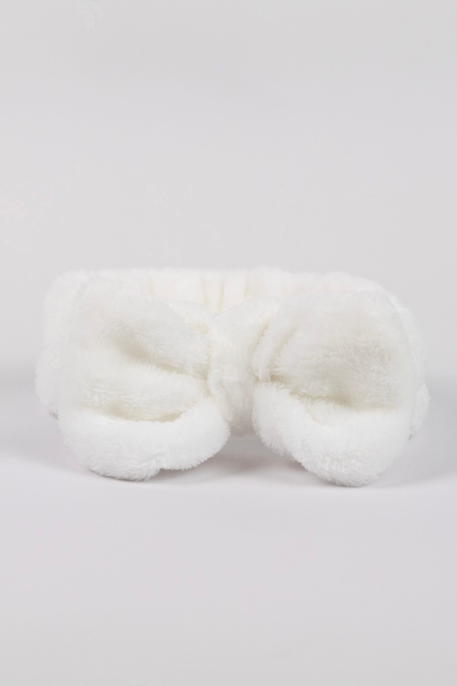 fluffy white ks kindred skincare headband to use for skincare routine to wash face with and keep hair back